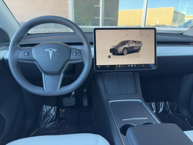 used 2023 Tesla Model Y car, priced at $32,977