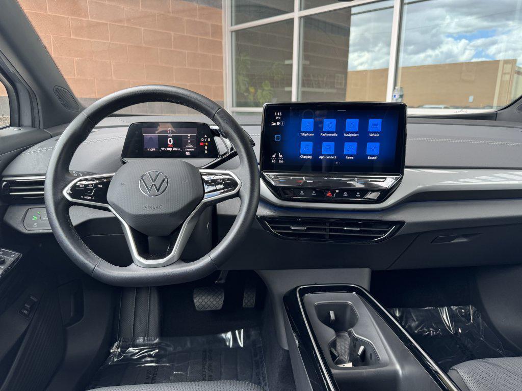 used 2023 Volkswagen ID.4 car, priced at $25,977