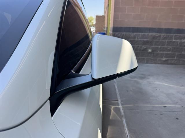 used 2023 Tesla Model Y car, priced at $32,477