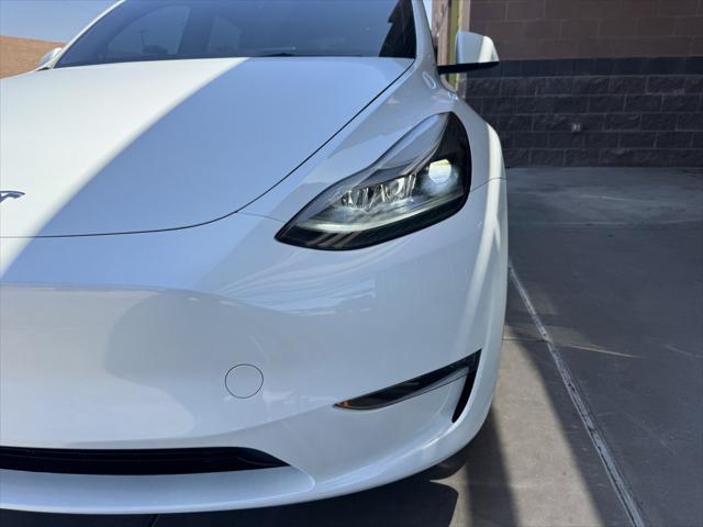 used 2023 Tesla Model Y car, priced at $32,477