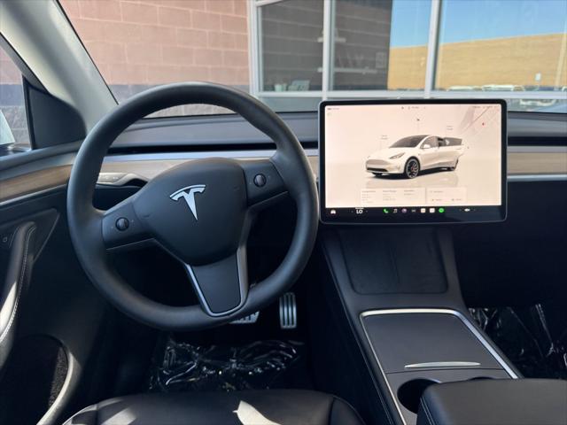 used 2023 Tesla Model Y car, priced at $32,477