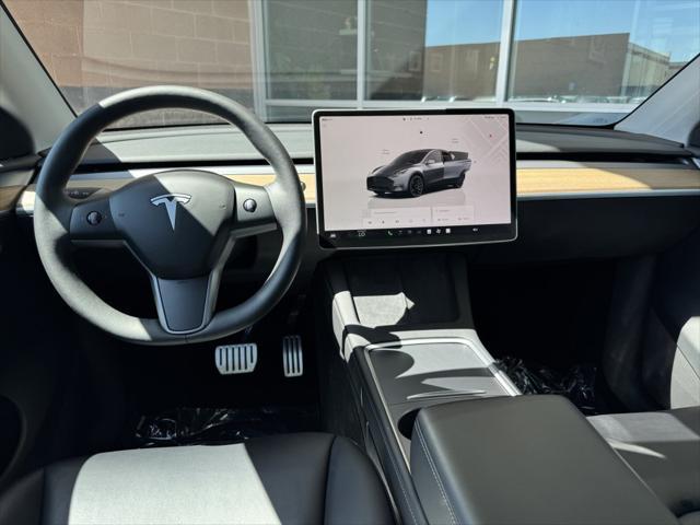 used 2023 Tesla Model Y car, priced at $34,977