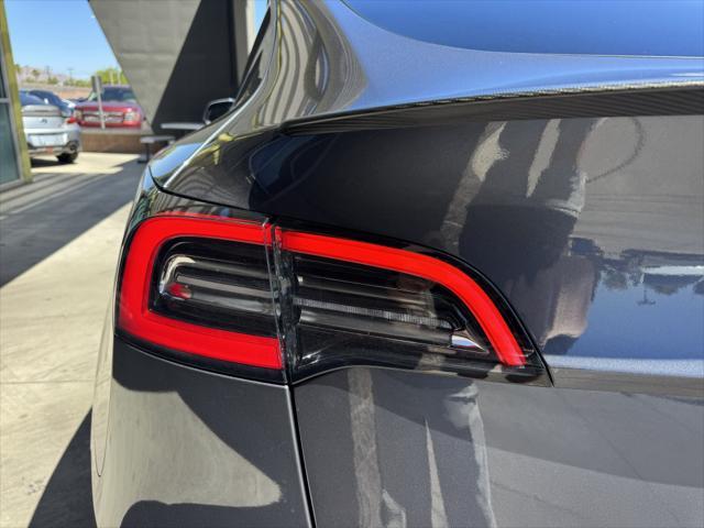 used 2023 Tesla Model Y car, priced at $34,977