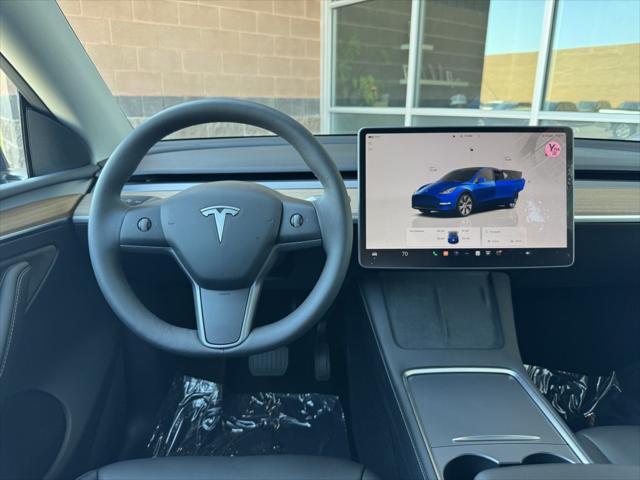 used 2024 Tesla Model Y car, priced at $39,477