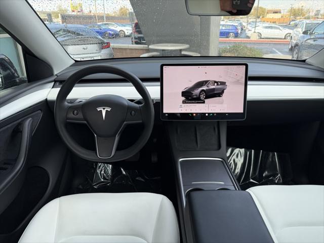 used 2023 Tesla Model Y car, priced at $32,777