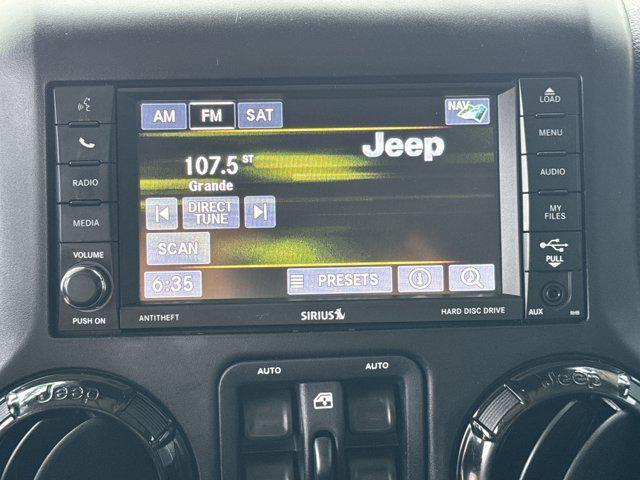 used 2014 Jeep Wrangler Unlimited car, priced at $19,988