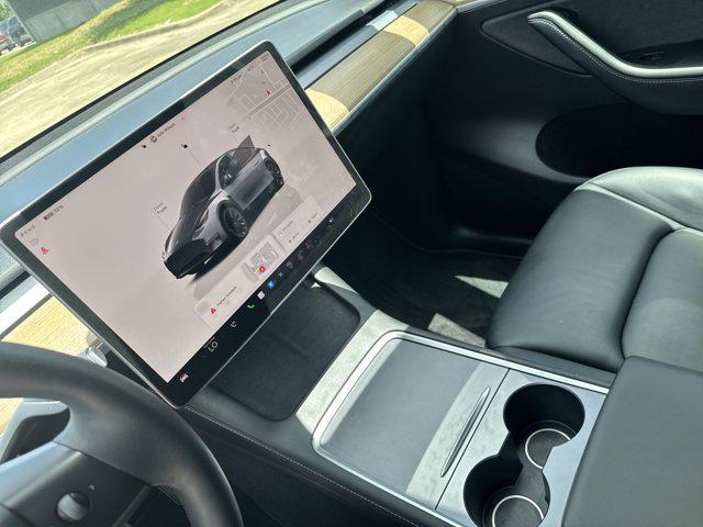 used 2023 Tesla Model Y car, priced at $27,498