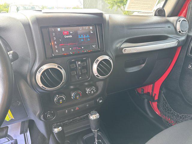 used 2014 Jeep Wrangler Unlimited car, priced at $15,999
