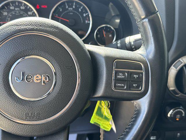 used 2014 Jeep Wrangler Unlimited car, priced at $16,999