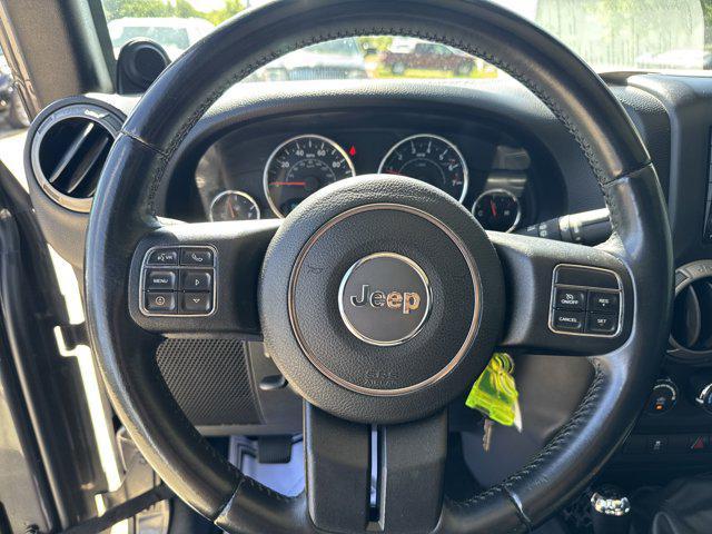 used 2014 Jeep Wrangler Unlimited car, priced at $16,999