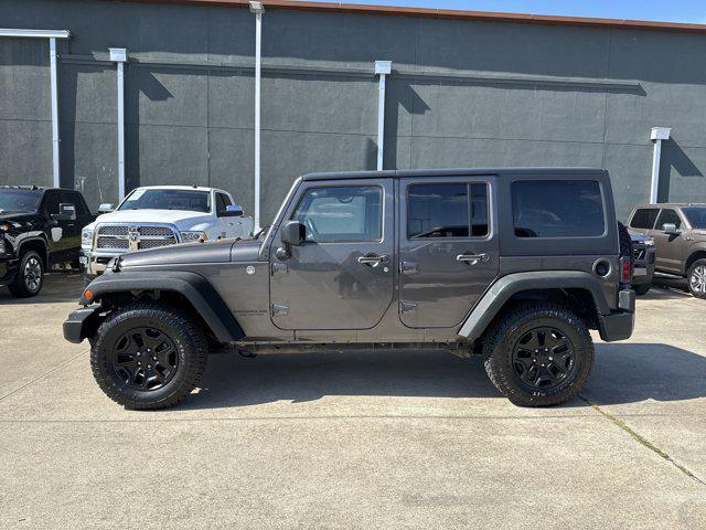 used 2014 Jeep Wrangler Unlimited car, priced at $16,999