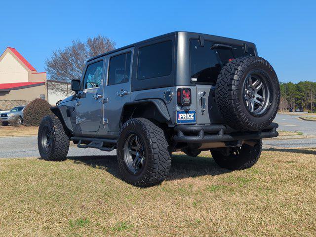 used 2014 Jeep Wrangler Unlimited car, priced at $13,995