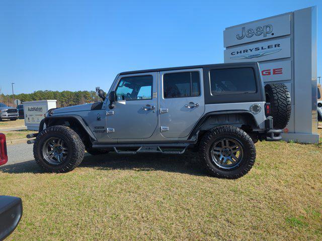 used 2014 Jeep Wrangler Unlimited car, priced at $13,995