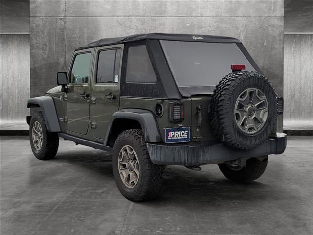 used 2015 Jeep Wrangler Unlimited car, priced at $19,670