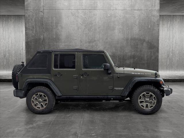 used 2015 Jeep Wrangler Unlimited car, priced at $19,670