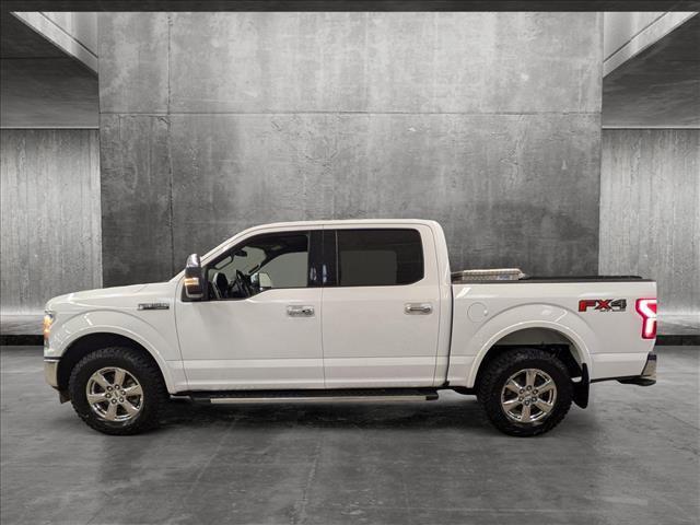 used 2018 Ford F-150 car, priced at $28,136