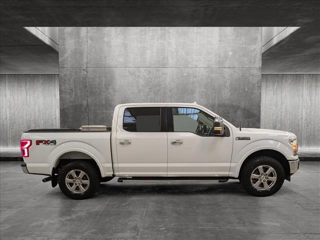 used 2018 Ford F-150 car, priced at $28,136