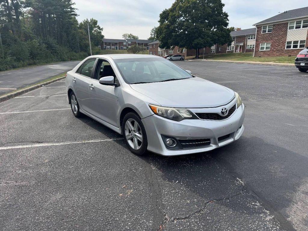 used 2014 Toyota Camry car, priced at $6,900