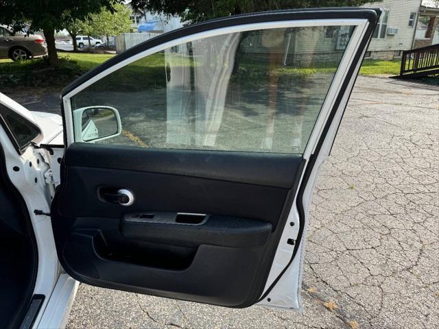 used 2011 Nissan Versa car, priced at $4,900