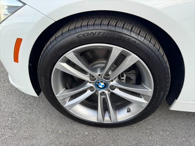 used 2018 BMW 330e car, priced at $15,900