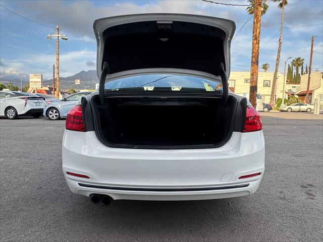 used 2018 BMW 330e car, priced at $15,900