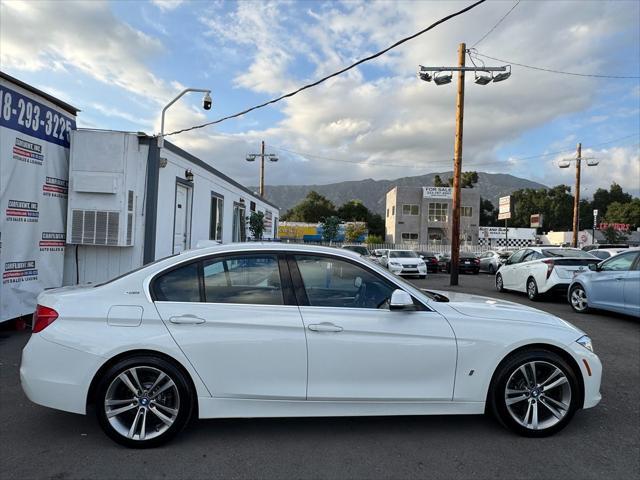 used 2018 BMW 330e car, priced at $15,900