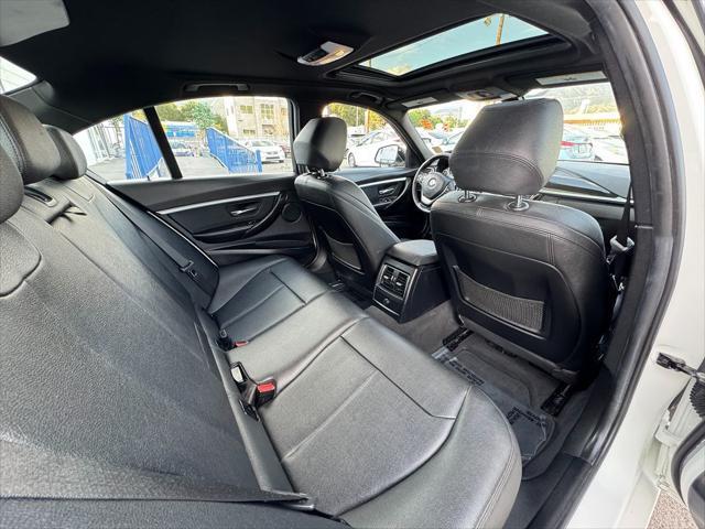 used 2018 BMW 330e car, priced at $15,900
