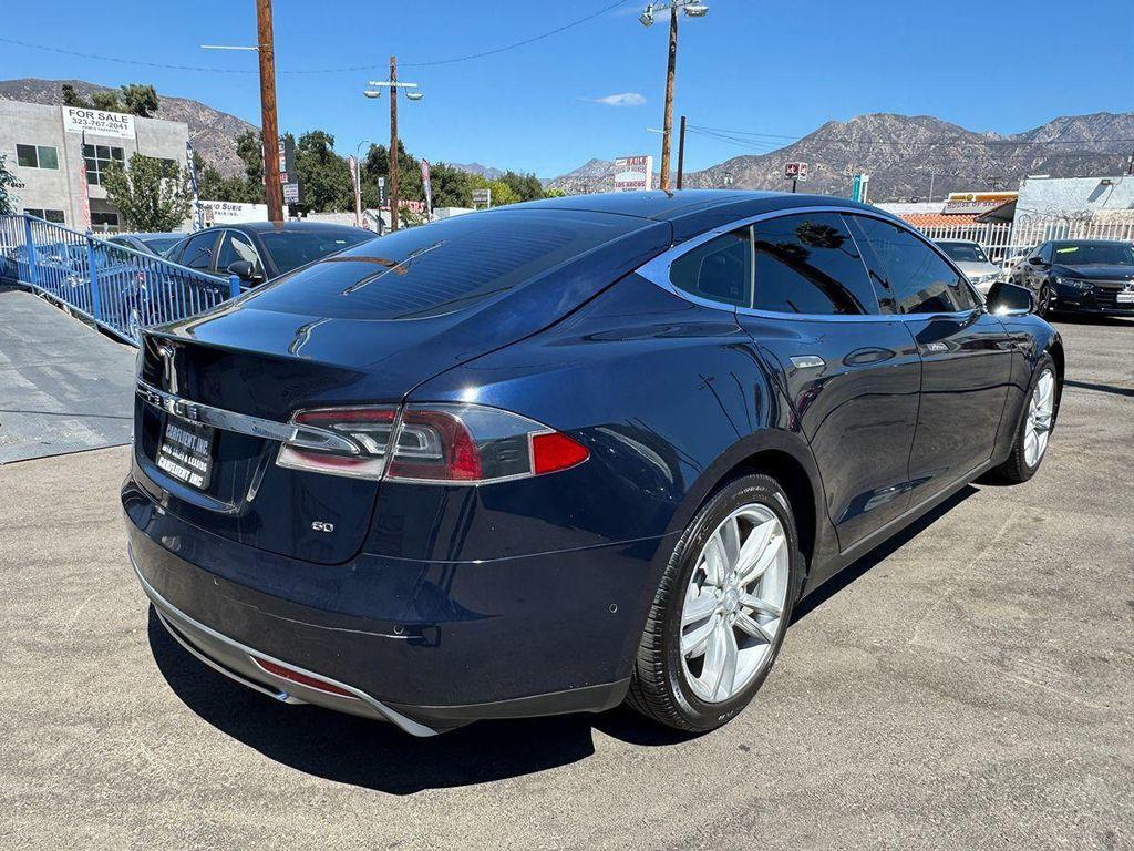 used 2014 Tesla Model S car, priced at $12,999