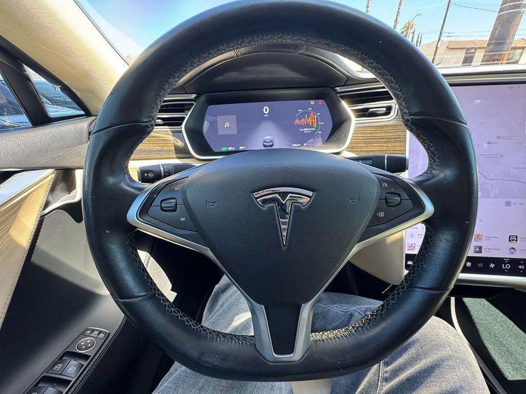 used 2014 Tesla Model S car, priced at $12,999