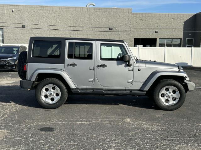 used 2014 Jeep Wrangler Unlimited car, priced at $13,945