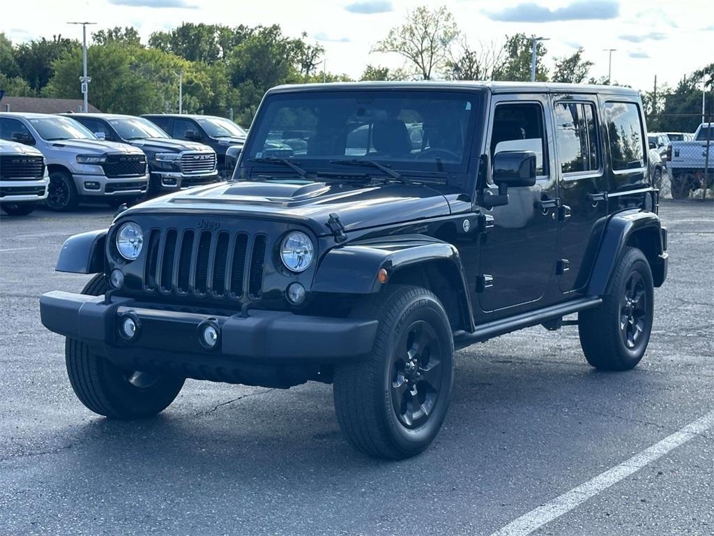 used 2015 Jeep Wrangler Unlimited car, priced at $18,995