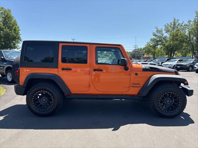 used 2012 Jeep Wrangler Unlimited car, priced at $14,995