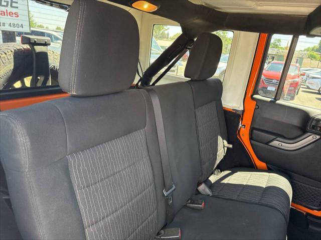 used 2012 Jeep Wrangler Unlimited car, priced at $14,995