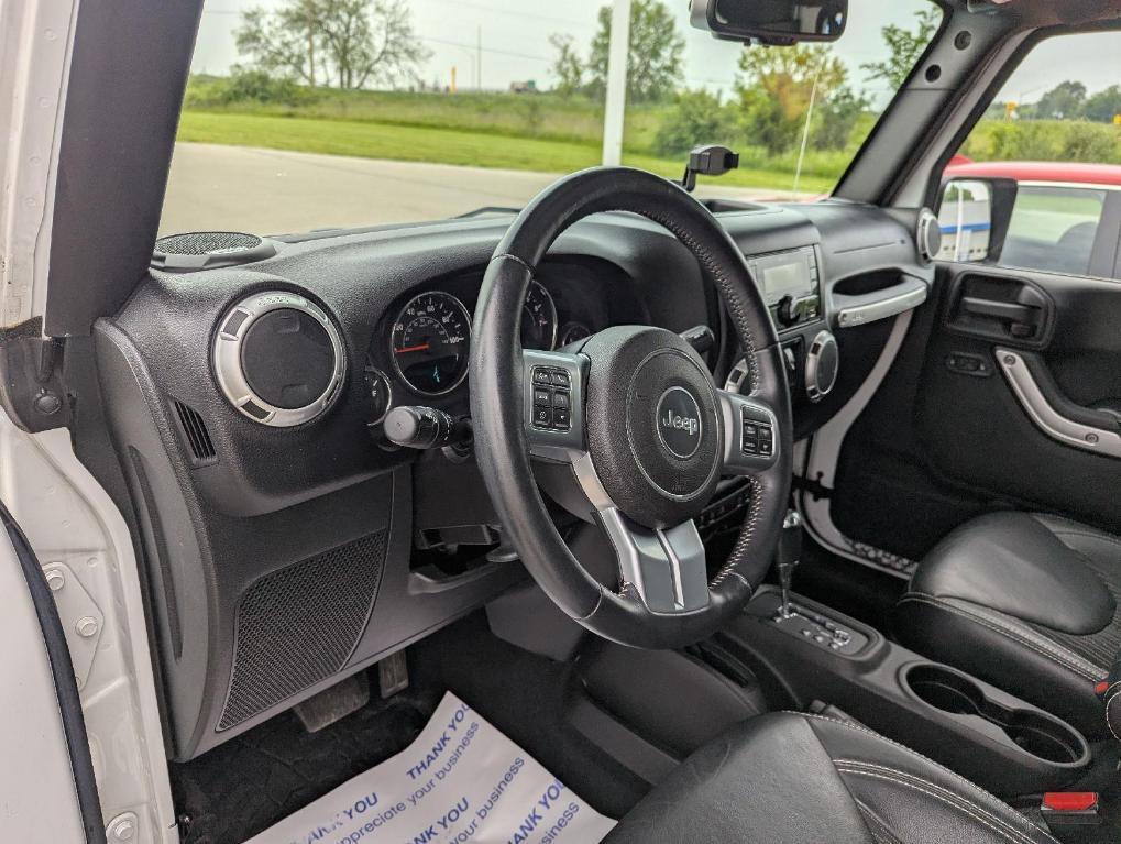 used 2015 Jeep Wrangler Unlimited car, priced at $17,929