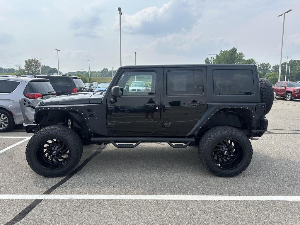 used 2015 Jeep Wrangler Unlimited car, priced at $14,975