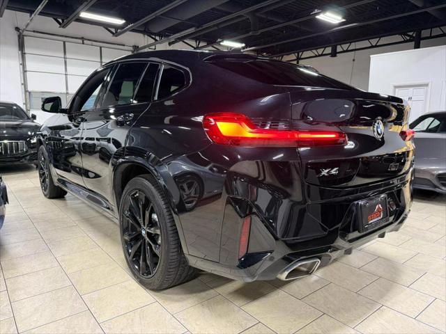 used 2022 BMW X4 car, priced at $38,995