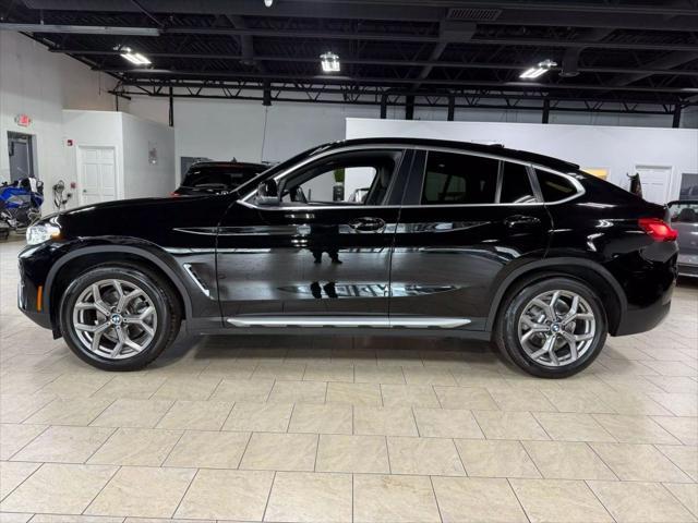 used 2022 BMW X4 car, priced at $34,985