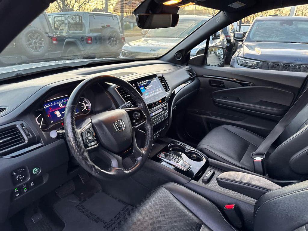 used 2023 Honda Passport car, priced at $34,900