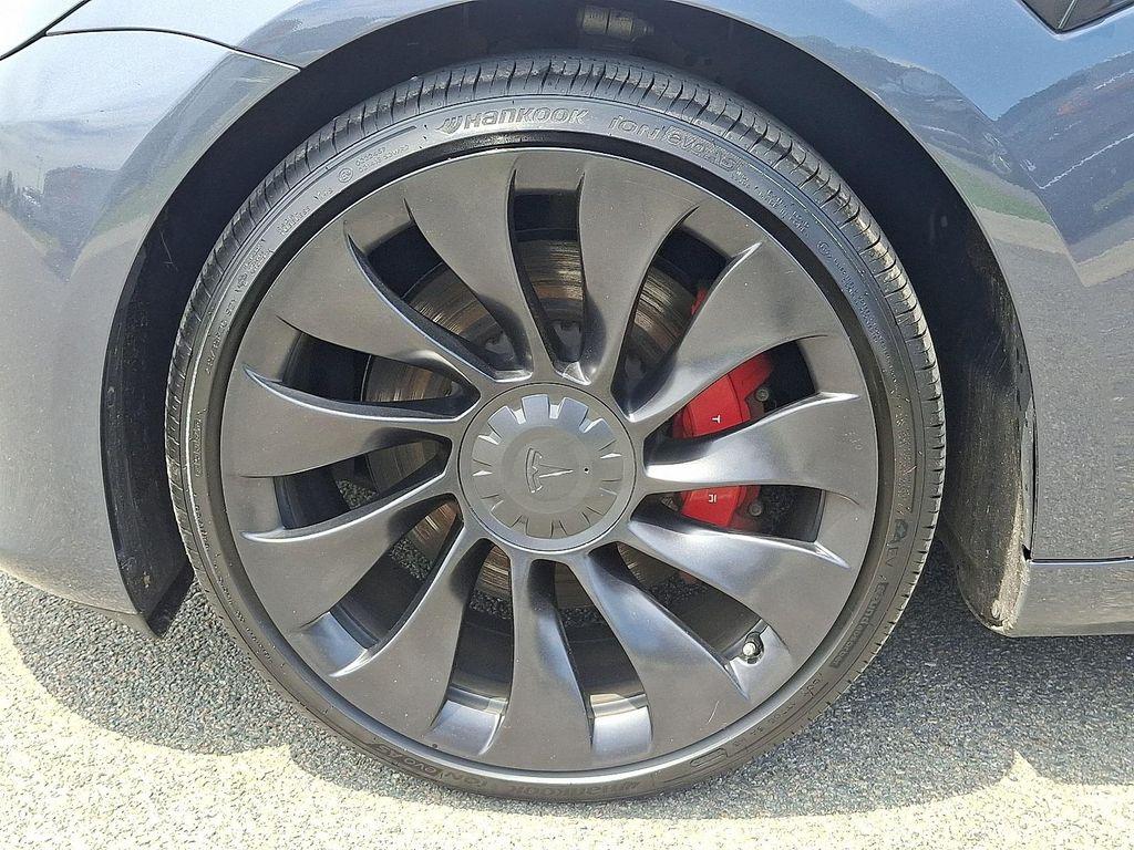 used 2023 Tesla Model 3 car, priced at $25,298