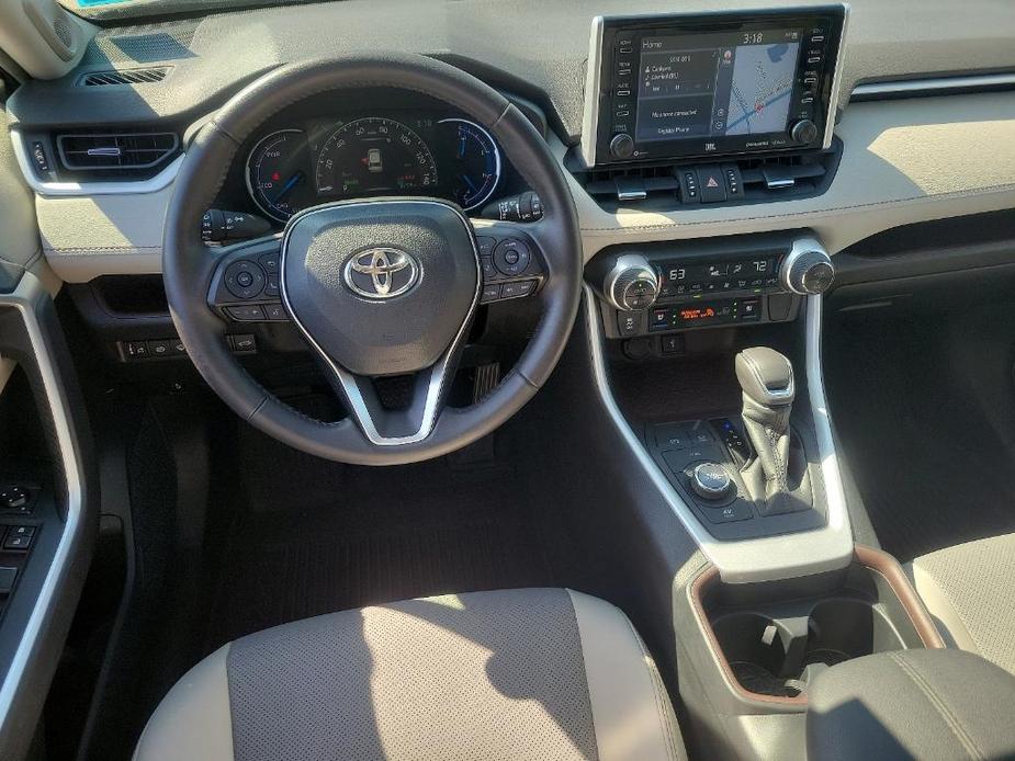 used 2021 Toyota RAV4 Hybrid car, priced at $27,493