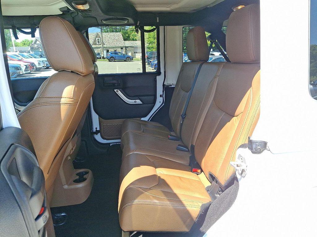 used 2013 Jeep Wrangler Unlimited car, priced at $11,995