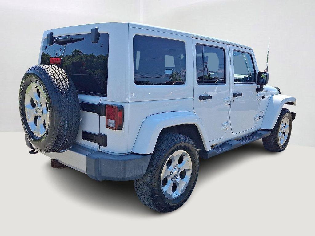 used 2013 Jeep Wrangler Unlimited car, priced at $11,995
