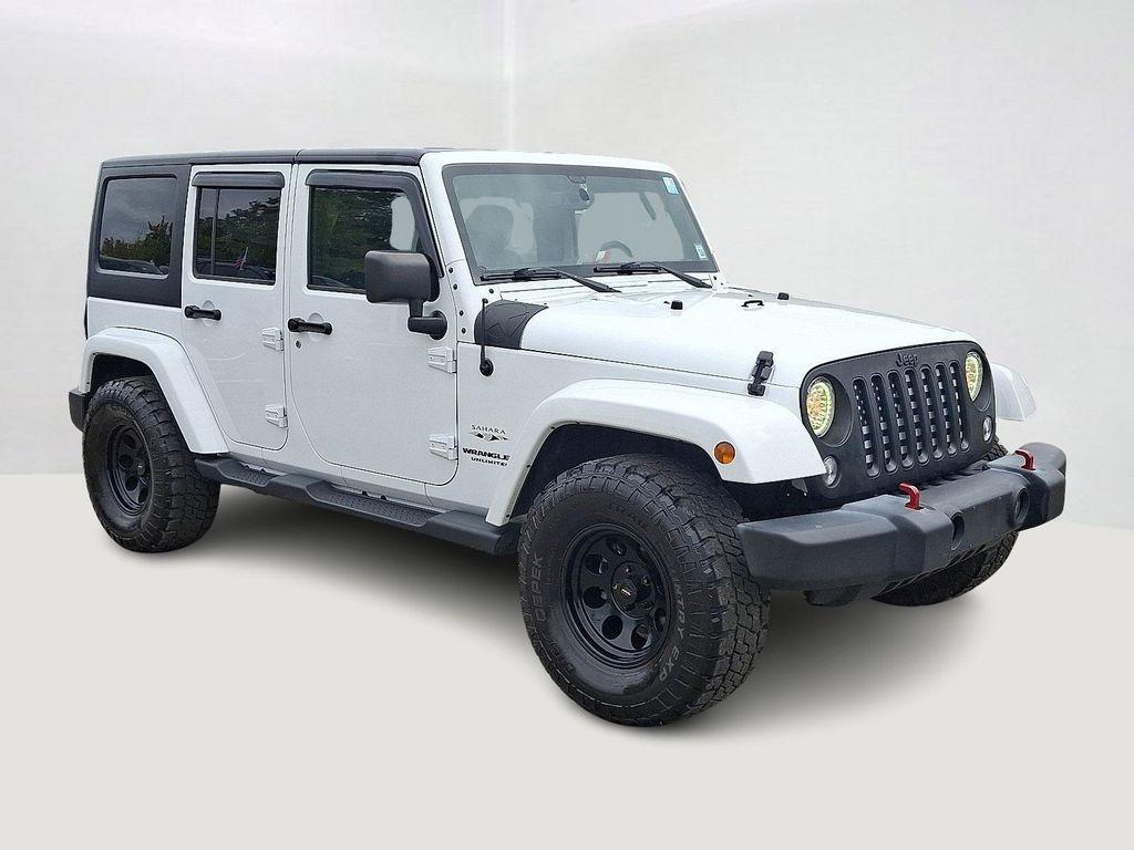 used 2016 Jeep Wrangler Unlimited car, priced at $17,491