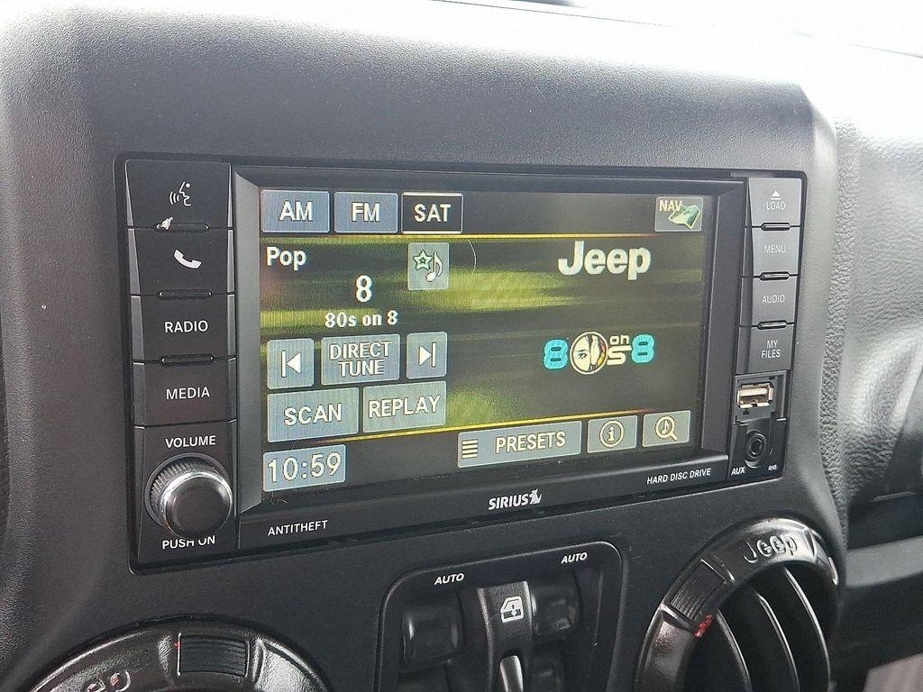 used 2016 Jeep Wrangler Unlimited car, priced at $17,491