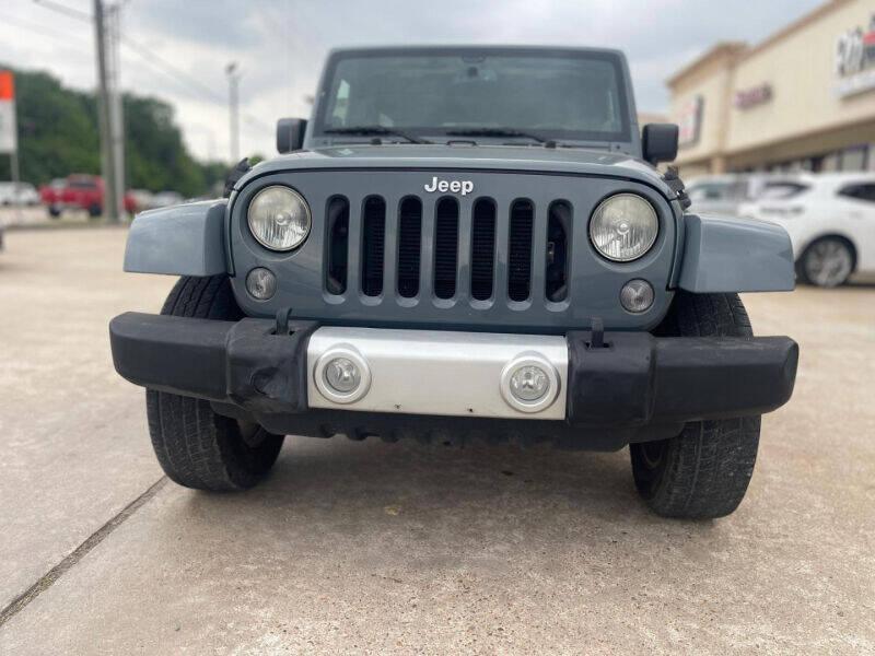 used 2014 Jeep Wrangler Unlimited car, priced at $15,995