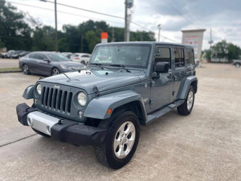 used 2014 Jeep Wrangler Unlimited car, priced at $15,995