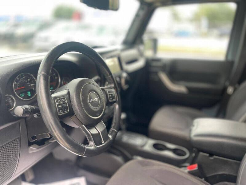 used 2014 Jeep Wrangler Unlimited car, priced at $15,995