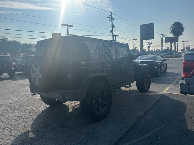 used 2016 Jeep Wrangler Unlimited car, priced at $21,544