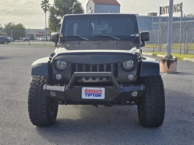 used 2016 Jeep Wrangler Unlimited car, priced at $21,544