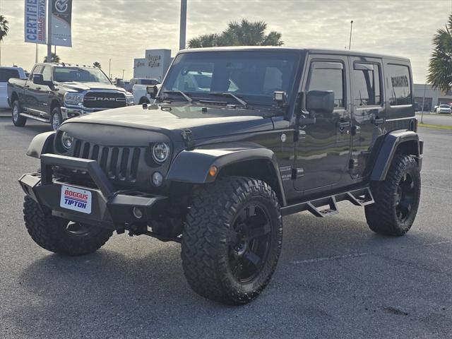 used 2016 Jeep Wrangler Unlimited car, priced at $21,544